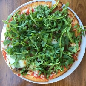 Gluten-free arugula pizza from Rosti Tuscan Kitchen